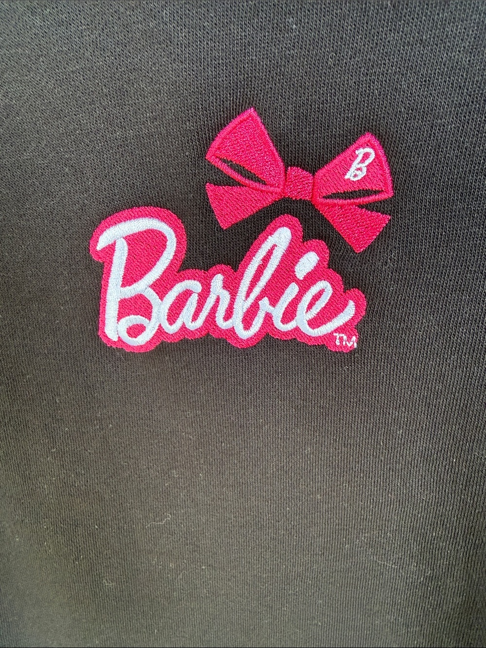 Barbie Black Sweatshirt with Hot Pink Logo and Bow - Picture 2 of 3